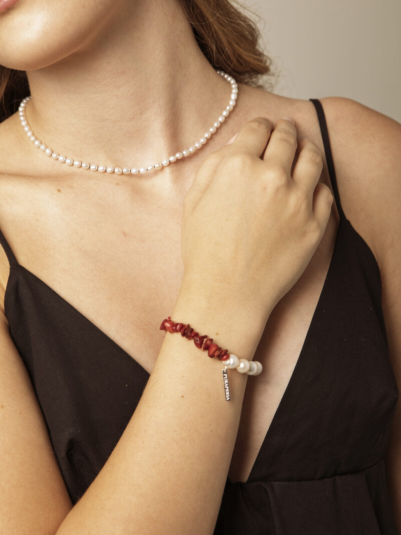 Red Coral & Cultured Pearl Bracelet in an original styled photograph