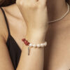 Red Coral & Cultured Pearl Bracelet in an original styled photograph