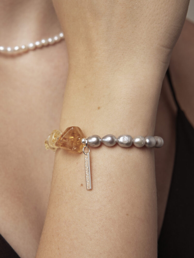 Aura & Qi lifestyle PURAERIA1598 Citrine & Cultured Pearl Bracelet in an original styled photograph