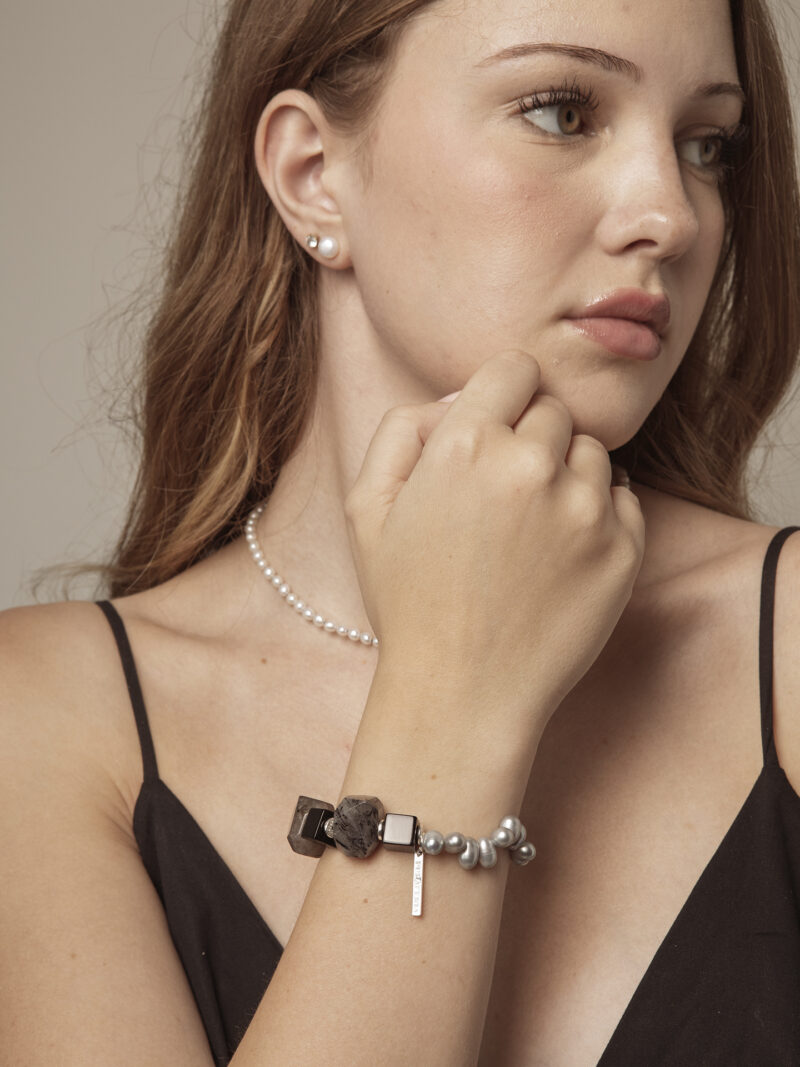 Agate, Rutilated Quartz & Cultured Pearl Bracelet in an original styled photograph